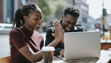 Girl and dad high five